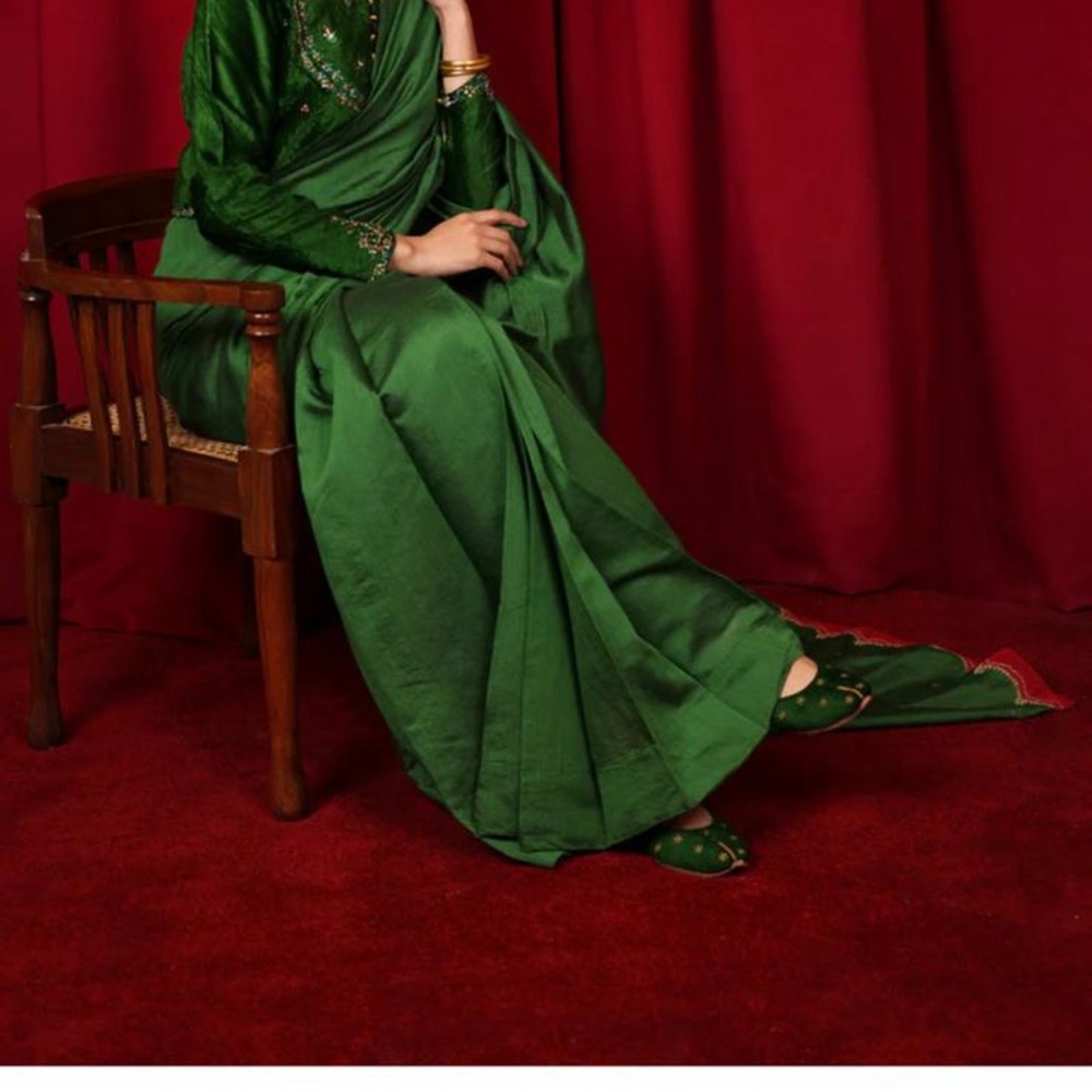 Elegant Green Saree with Embellishments